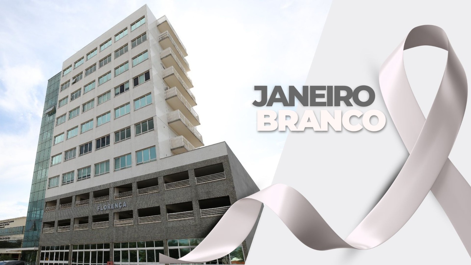 Fachada do prédio onde funciona o NAPsi, em tons claros, com janelas envidraçadas. À direita da imagem, há um fundo branco com o texto “Janeiro Branco” e um laço branco em destaque, símbolo da campanha de conscientização sobre saúde mental.